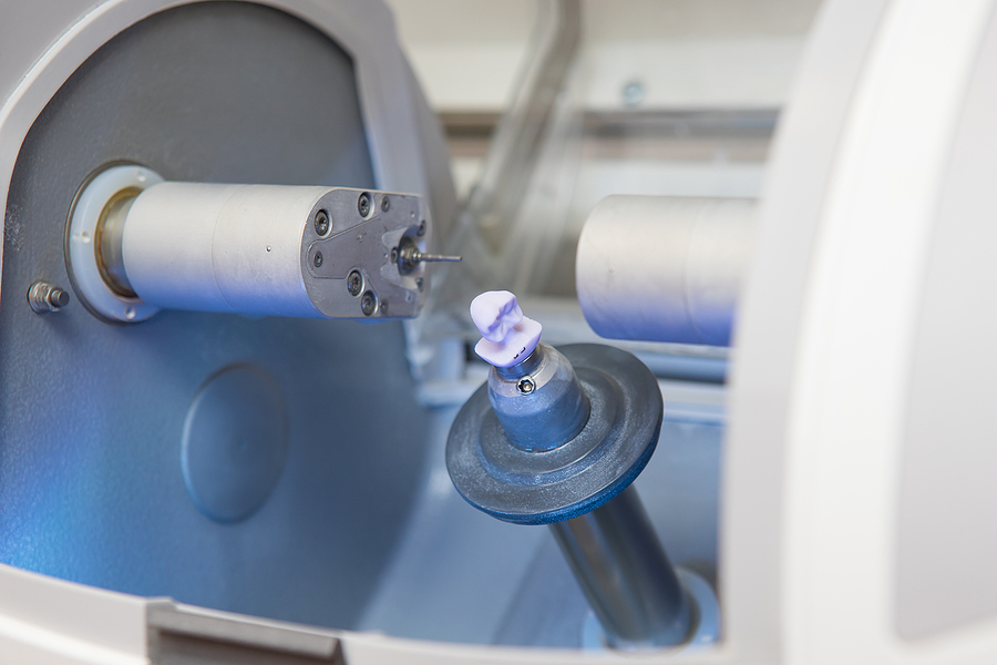 Finished Dental Implant In The Cerec Dental Milling Machine In T